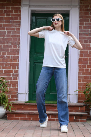 White women’s t-shirt with ribbon knot sticker design – casual round neck top in interlock cotton