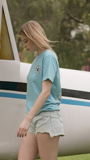 Blue T-shirt with Flower Graphic